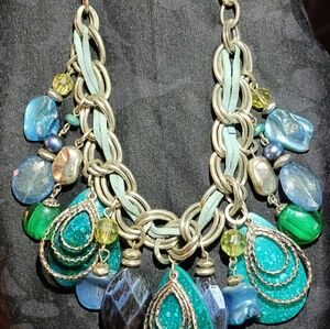 Faux suede silver tone statement boho charm necklace